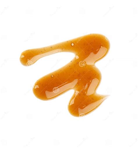 Caramel Syrup Drizzle Isolated On White Background Splashes Of Sweet