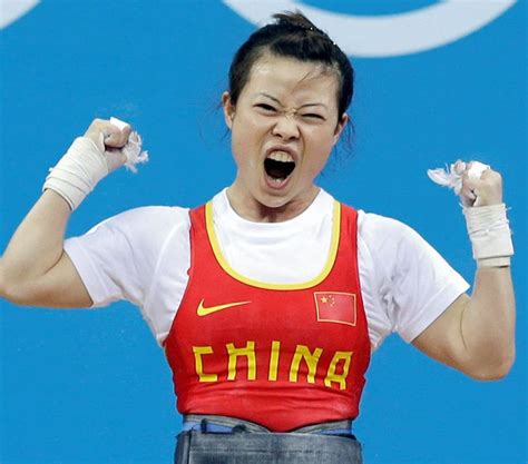 Chinese weight-lifting gold medalist Wang Mingjuan rejoices in victory ...