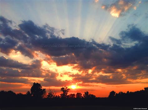 Crepuscular Rays at Sunrise & Clouds Water droplets & Sun Rays