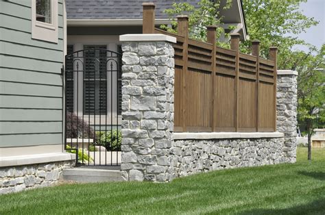 Home Housevolve Stone And Wood Fence Fence Design Wood Fence