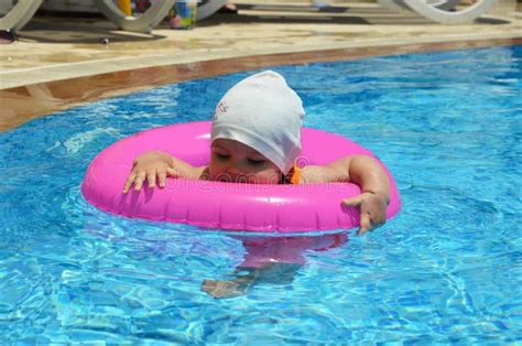 Little Girl Swimming Pool Floatie Stock Photos - Free & Royalty-Free Stock Photos from Dreamstime