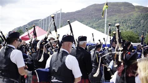 Premium Photo Musicians Playing Bagpipes During Event