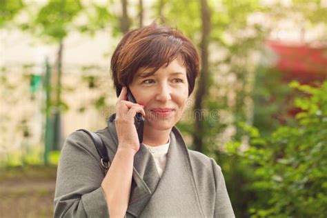 Pretty Mature Woman Phone Outdoors Portrait Stock Photo Image Of Business Mobile
