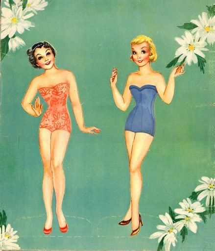 Two Women In Swimsuits Standing Next To Each Other With Daisies Around Them