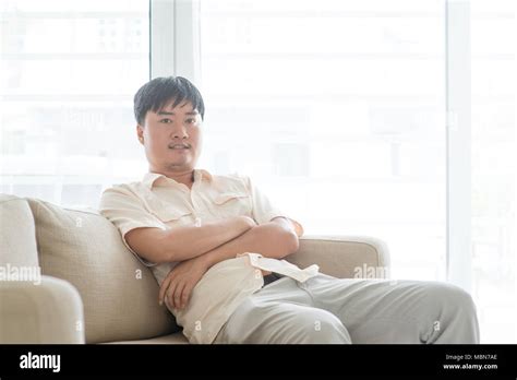 Portrait Of Asian Mature Man At Home People Indoor Lifestyle Stock
