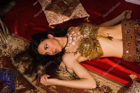 Crime Scene Imitation Lifeless Woman In Oriental Costume Lying Stock