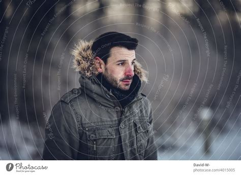 Girl In Cold Outside In Winter With Thick Winter Jacket A Royalty