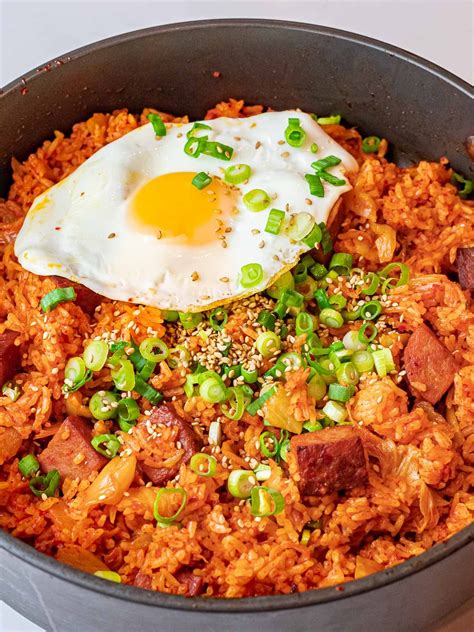 Kimchi Fried Rice With Spam And A Fried Sunny Side Up Egg With Scallions In A Pan Easy Korean