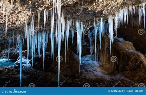 Many Icicles Hanging From The Ceiling Of The Cave Stock Image Image