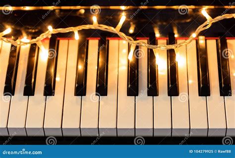 Christmas Lights On A Piano Keyboard Above View Stock Image Image Of