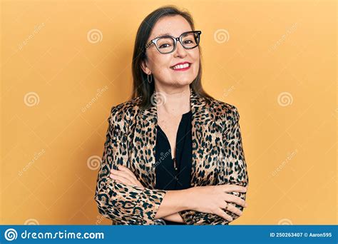 Middle Age Hispanic Woman Wearing Business Clothes And Glasses Happy