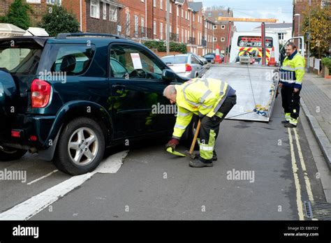 Car being towed away hi-res stock photography and images - Alamy