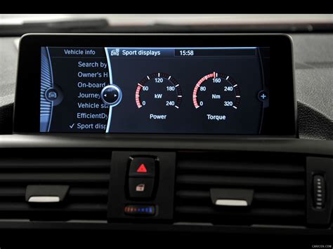 BMW 1-Series Sport Line (2012) - Central Display | Caricos