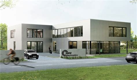 smw electronics breaks ground   facility smw autoblok