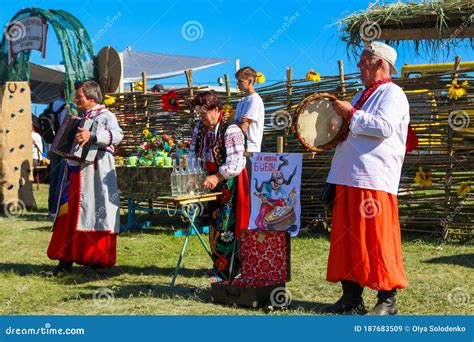 Folk Musicians In Traditional Ukrainian Clothing Performs During Ethno