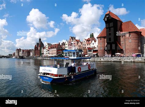 Person Ferry At Crane Gate Across River Motlawa Gdansk Poland Stock