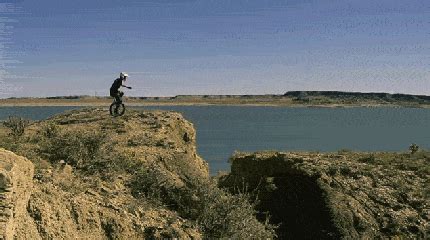 unicycle fail cliff jump gif | WiffleGif