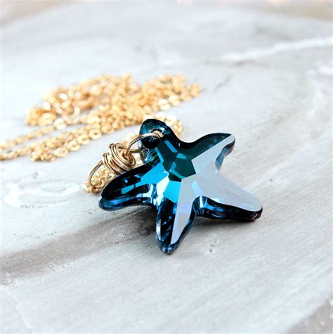 Blue Swarovski Necklace by Hildes on Etsy Don't know why, it's really not my style but I like it ...