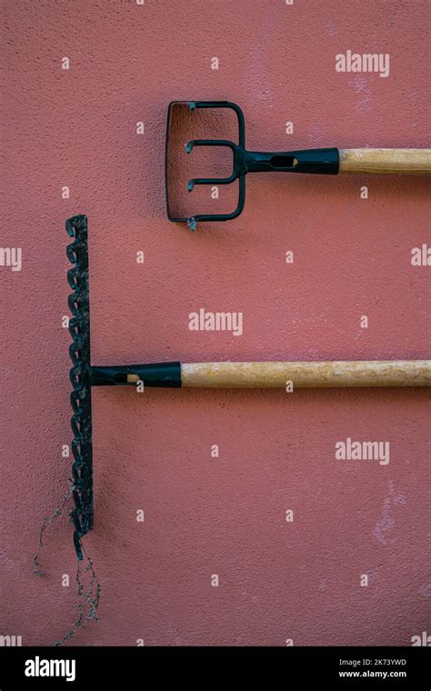 Pitchforks For Garden Work On A Wall Stock Photo Alamy