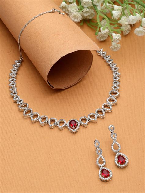 Buy Zeneme Rhodium Plated American Diamond Studded Jewellery Set