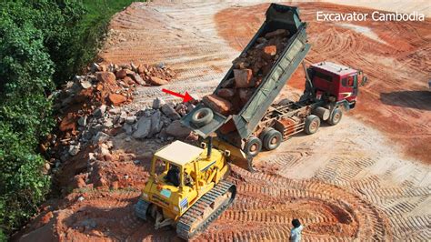 Ton Dump Truck Unloading Stone Stuck Helping By Bulldozer Dump