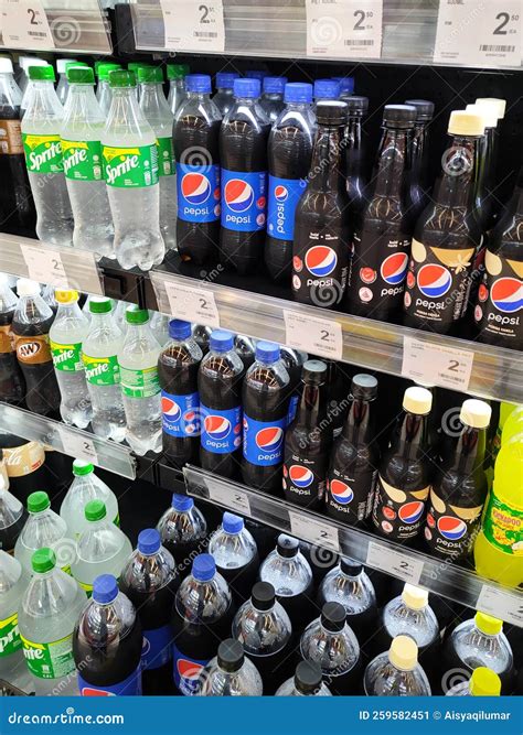 Soft Drinks Or Carbonated Drinks Displayed For Sale In The Supermarket