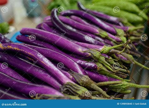 Purple Long Chinese Eggplants Stock Image - Image of local, east: 139893845