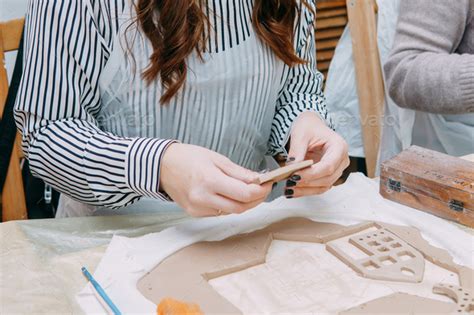 Womens Hands Knead Clay Drawing Elements Of The Product Production