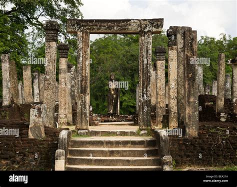 Standing Buddha Statue And Ancient Ruins In Atadage Polonnaruwa Sri