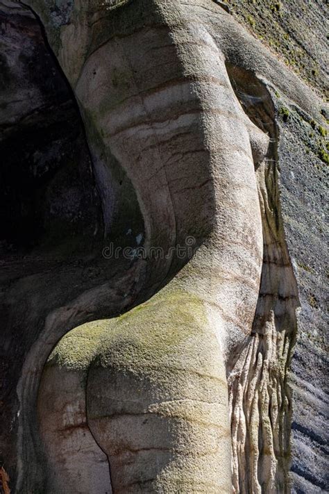 A Naked Body Of A Woman Carved Into A Rock In A Nature Editorial