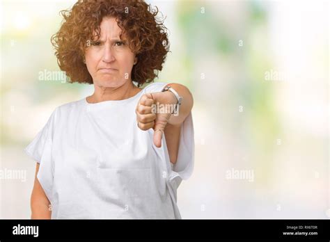 Beautiful Middle Ager Senior Woman Wearing White T Shirt Over Isolated