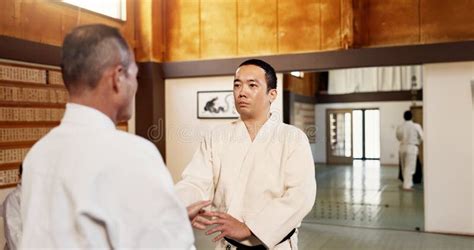 Aikido Dojo Men And Sensei For Martial Arts Learning Or Advice For