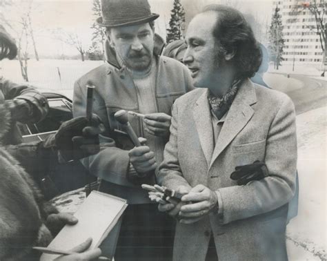 Canadian Prime Minister Pierre Trudeau Handing Out Cigars To Reporters Outside The Hospital