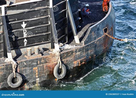 Various Views Of Vessels And Tugboats In Port Close Up View Of The