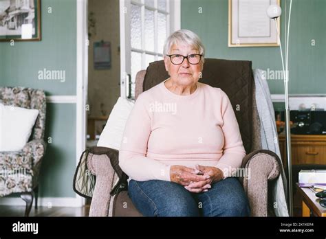 Portrait Of Smiling Senior Mature Retired Grandmother In Eyeglasses