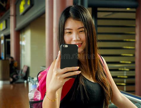 Young Happy And Beautiful Asian Chinese Woman Taking Selfie Picture