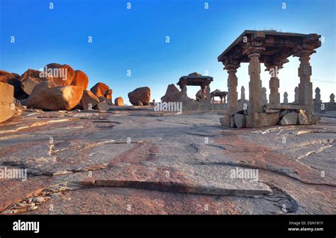 Ancient Ruins Of Vijayanagara Empire At Sunset Sky In Hampi Karnataka