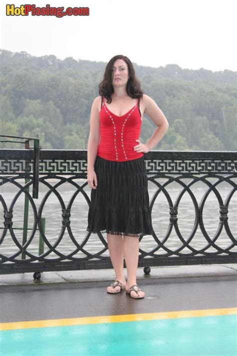 Fatty Lady Is Not Shy To Let Hot Pissing Flow Into Cold River Water