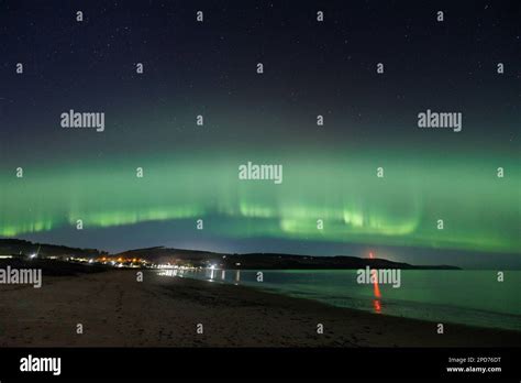 The Northern Lights Aurora Borealisover The Scottish Highlands Stock