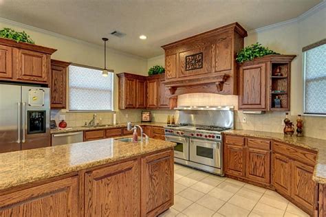 Photos of granite countertops with oak cabinets