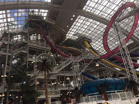 an indoor water park with slides and waterslides