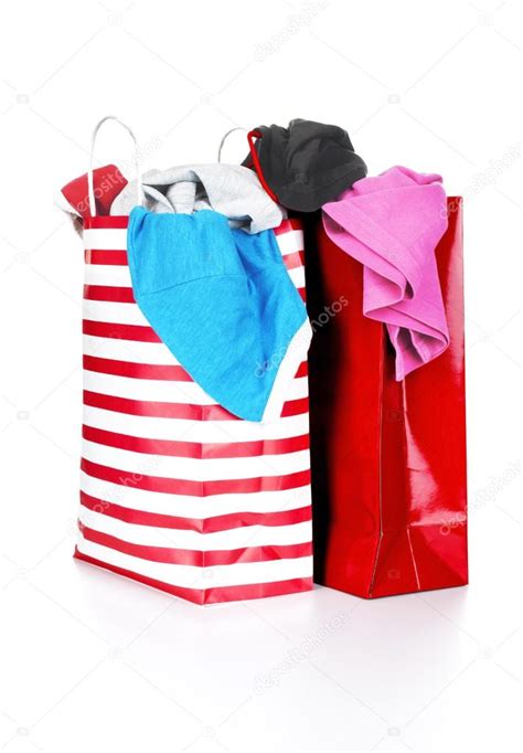 Paper shopping bags full of clothes — Stock Photo © urfingus #37819557