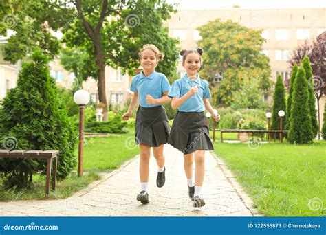 Boy In School Uniform Eating Potato Chip In Playground Royalty-Free Stock Image | CartoonDealer ...