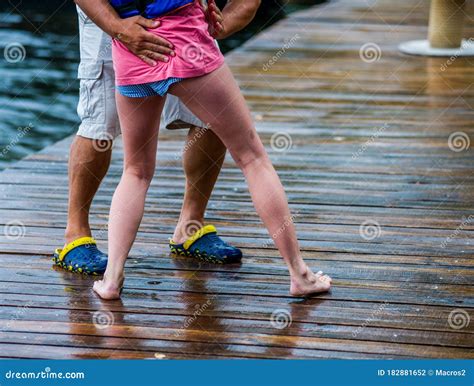 Booty Girls Active Rest On The Water Connected With A Board On The