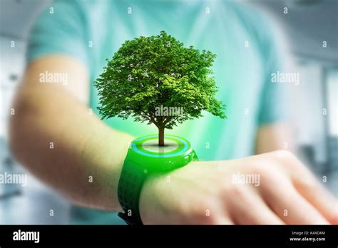 View Of A Green Tree Going Out Of A Smartphone Ecology Concept Stock