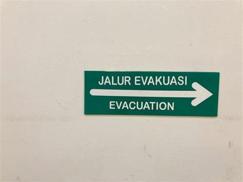 Premium Photo Emergency Evacuation Exit Icon Or Sign On The Wall