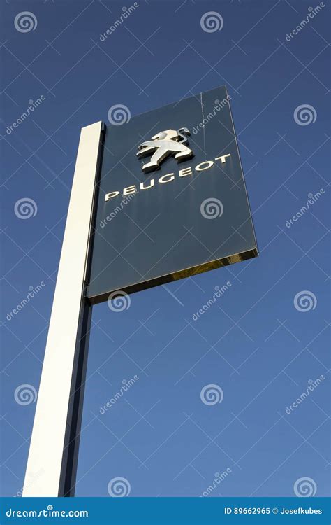 Peugeot Car Company Logo In Front Of Dealership Building On March 31 2017 In Prague Czech