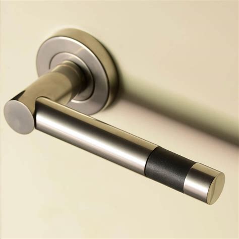 Turnstyle Design Door Handle Black Leather Antique Brass Model