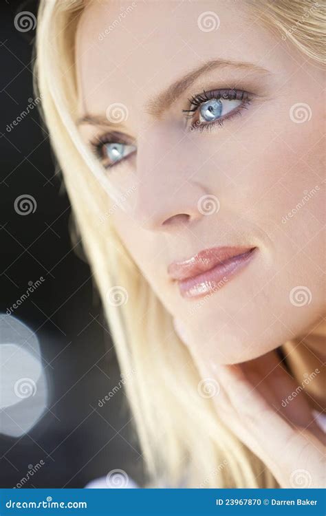 Portrait Of Beautiful Blond Woman With Blue Eyes Stock Photo - Image ...