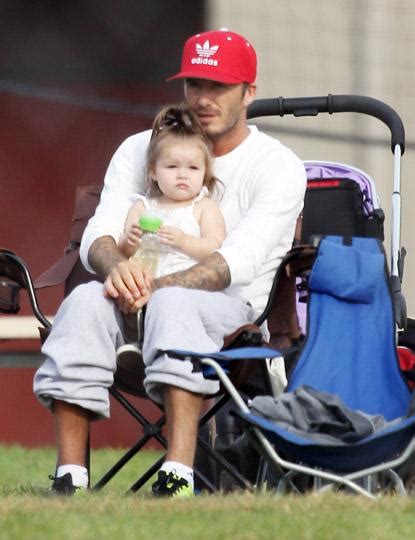 David Beckham Takes Baby Harper To Watch Her Brothers Play Soccer